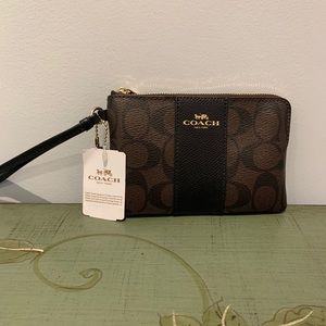 Coach Corner Zip Wristlet In Signature Canvas